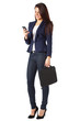 Beautiful businesswoman sending a message on smartphone