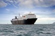 Foto: Cargo ship sailing close to coast Cargo ship sailing close to coast