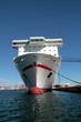 General cargo vessel docked in port.