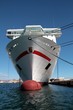 General cargo vessel docked in port.