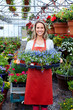 Woman working in nursery.