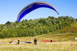 Paragliders are preparing to fly