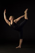 Beautiful, Fit Woman Performing Yoga Pose