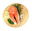 Fresh salmon steak on cutting board, isolated on white