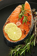 Fresh salmon steak on pan, close up
