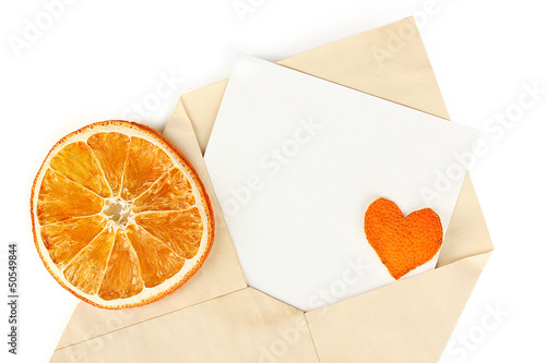 Photo: Old envelope with blank paper isolated on white Old envelope with blank paper isolated on white