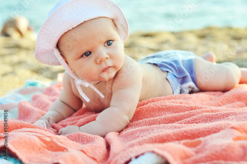 Photo: baby on the beach baby on the beach