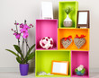 Beautiful colorful shelves with different home related objects
