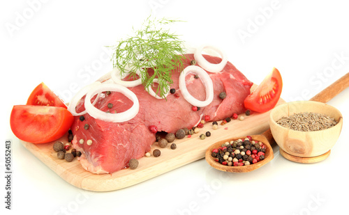 Photo: Raw beef meat marinated with herbs and spices isolated on white Raw beef meat marinated with herbs and spices isolated on white
