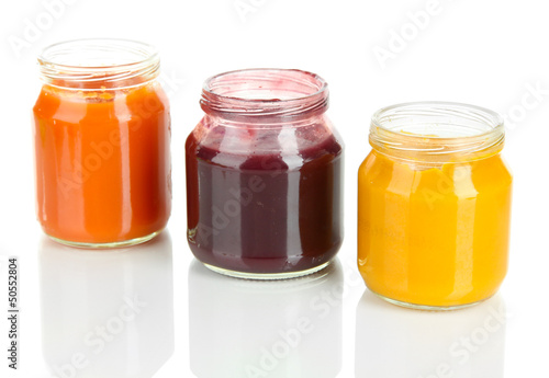 Photo: Baby puree in jars isolated on white Baby puree in jars isolated on white