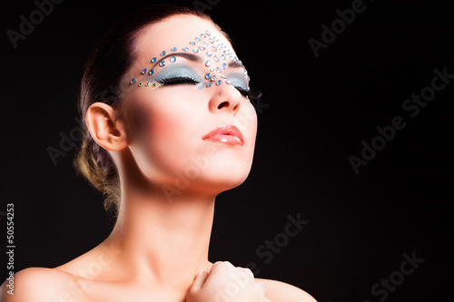 Photo: attraktive Frau mit aufwendigem Make-Up attraktive Frau mit aufwendigem Make-Up