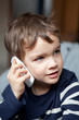 Portrait of boy with mobile phone
