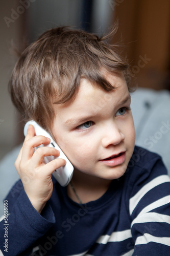 Photo: Portrait of boy with mobile phone Portrait of boy with mobile phone