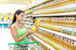 woman buying sunflower oil