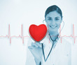 Doctor holding stethoscope up to red ECG line with heart graphic