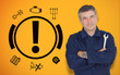Mature mechanic standing next to car warning signals