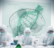 Chemists working with futuristic interface showing scientific di