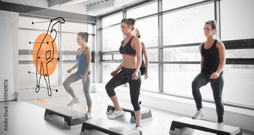 Photo: Women doing exercise with futuristic interface demonstration Women doing exercise with futuristic interface demonstration