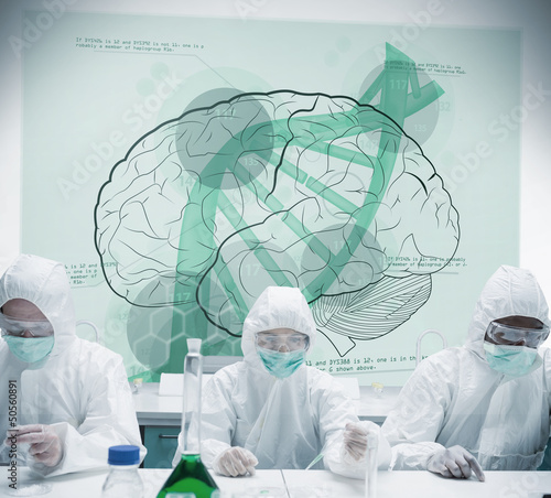 Photo: Chemists working with futuristic interface showing scientific di Chemists working with futuristic interface showing scientific di