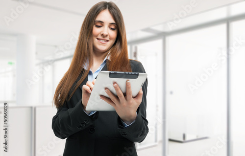 Photo: Woman using a tablet Woman using a tablet
