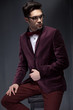 sexy fashion male model dressed elegant - casual posing against