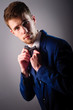 Portrait of handsome stylish man in elegant blue suit