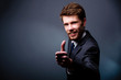 Smiling businessman with thumbs up