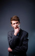 Thoughtful young businessman