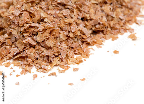 Photo: wheat bran isolated on white background wheat bran isolated on white background