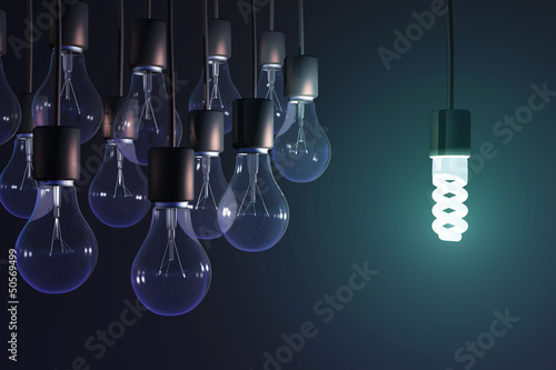 Illustration: energy-saving lamp among the gray bulb energy-saving lamp among the gray bulb