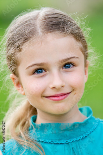 Photo: Happy child - portrait of lovely girl Happy child - portrait of lovely girl