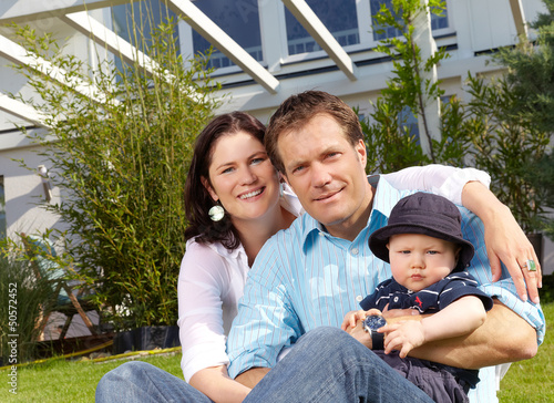 Photo: Family with house and garden Family with house and garden