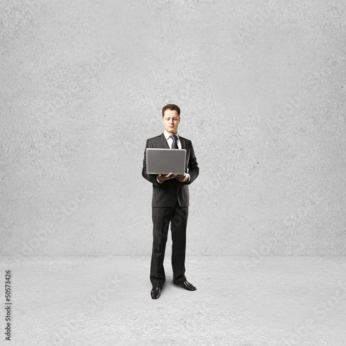 Photo: businessman with laptop businessman with laptop