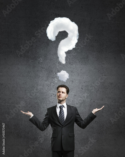 Photo: man with question mark man with question mark