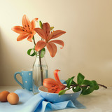 Still life with lily flowers and polka dots tableware