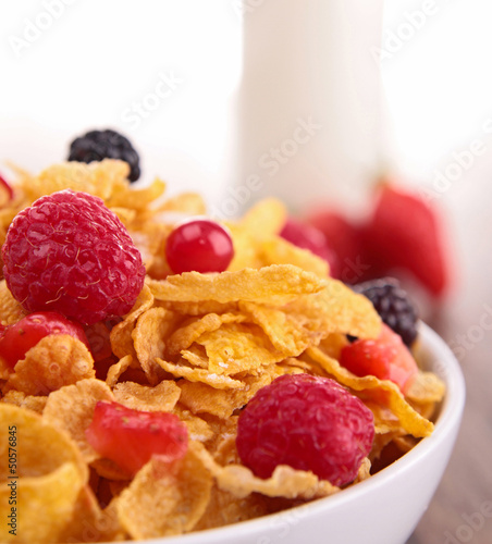 Photo: bowl of corn flakes with berries fruits bowl of corn flakes with berries fruits