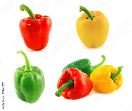 Photo: Red,green and yellow bell peppers on white background Red,green and yellow bell peppers on white background