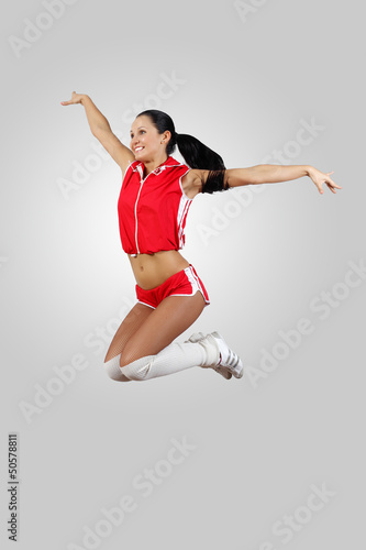 Photo: Young female dancer against white background Young female dancer against white background