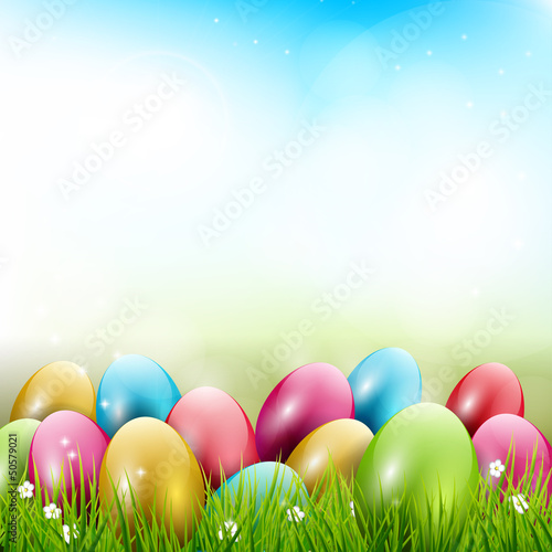 Vector: Easter background with colorful eggs in grass Easter background with colorful eggs in grass