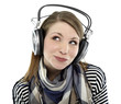 Photo: Beautiful young smiling woman listens to music Beautiful young smiling woman listens to music