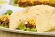Shredded beef taco with salsa, sour cream and cheese