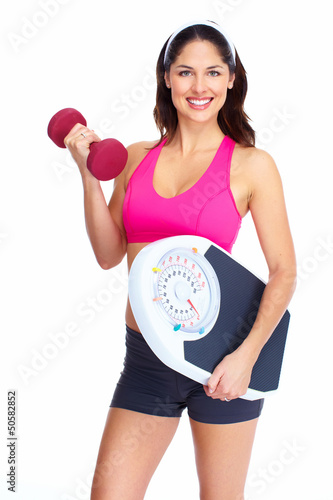 Photo: Young beautiful fitness woman. Young beautiful fitness woman.