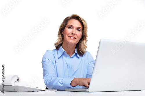 Photo: Business woman with a laptop computer. Business woman with a laptop computer.