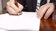 Businessman signing a contract