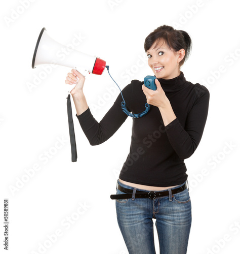 Photo: young woman with megaphone looking at the camera young woman with megaphone looking at the camera