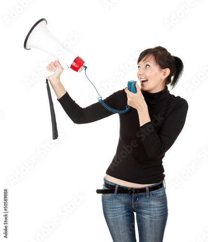 Photo: screaming young woman with megaphone screaming young woman with megaphone