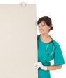 female doctor keeping  blank billboard