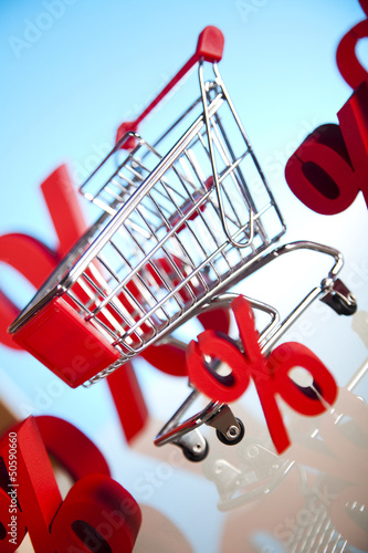 Photo: Shopping supermarket cart, percent sign Shopping supermarket cart, percent sign