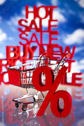 Photo: Shopping supermarket cart, percent sign Shopping supermarket cart, percent sign
