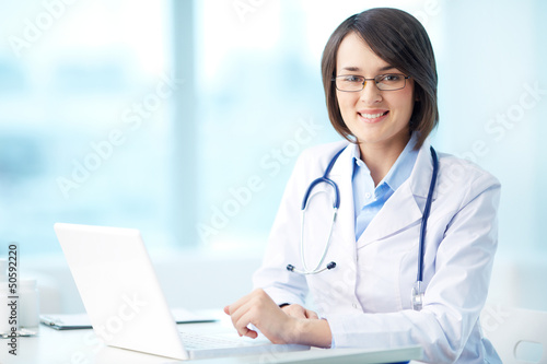 Photo: Physician at workplace Physician at workplace